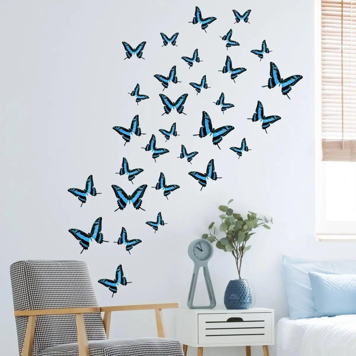 30 butterfly wall decor stickers in various sizes, creating a whimsical design on a living room wall.