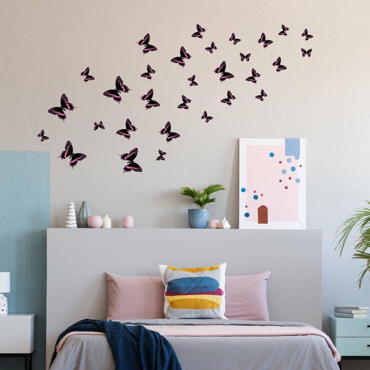 Colorful butterfly wall decor stickers in a modern bedroom, adding whimsy and charm to the space.