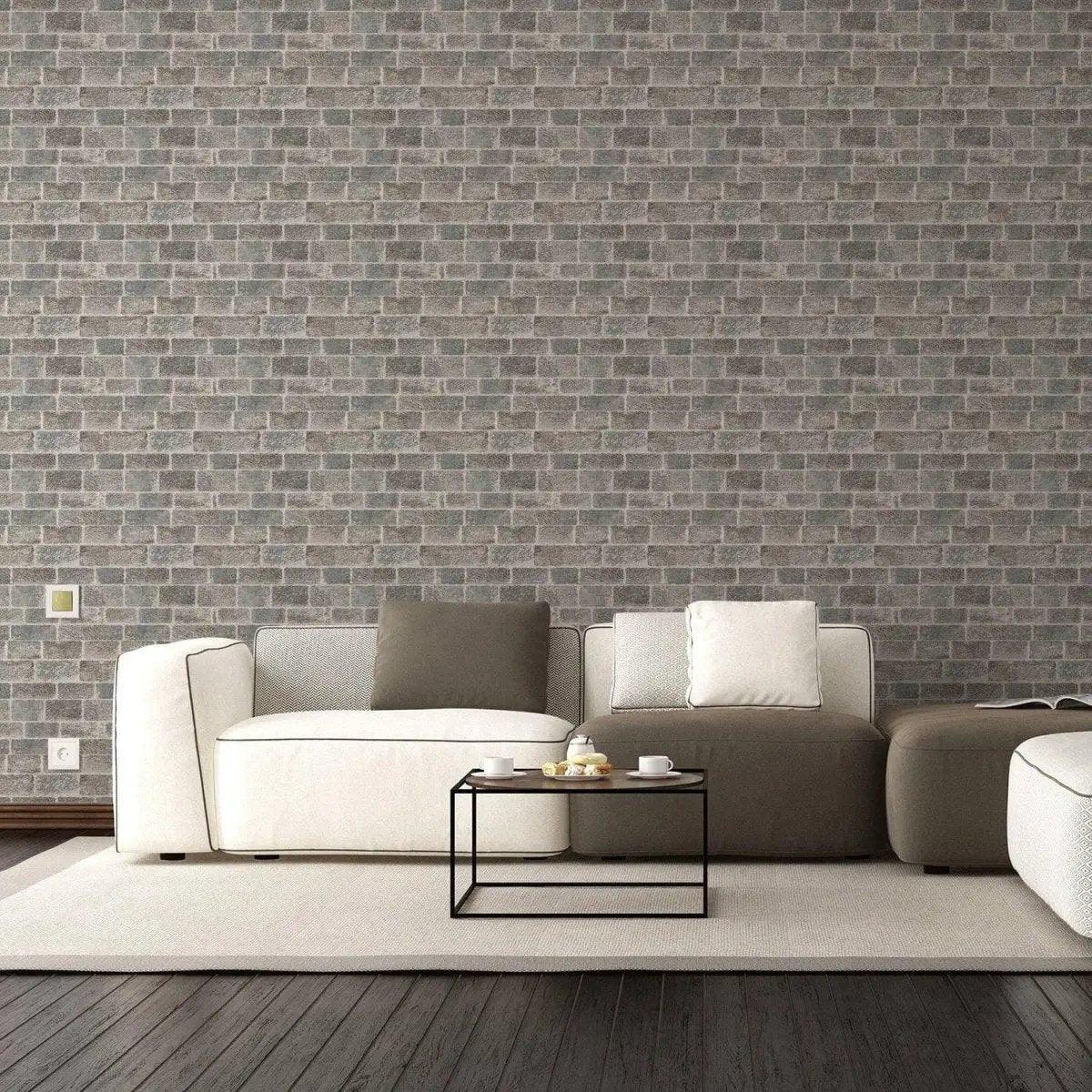 Cozy living room featuring 3D faux stone wall panels with a white couch and modern decor.