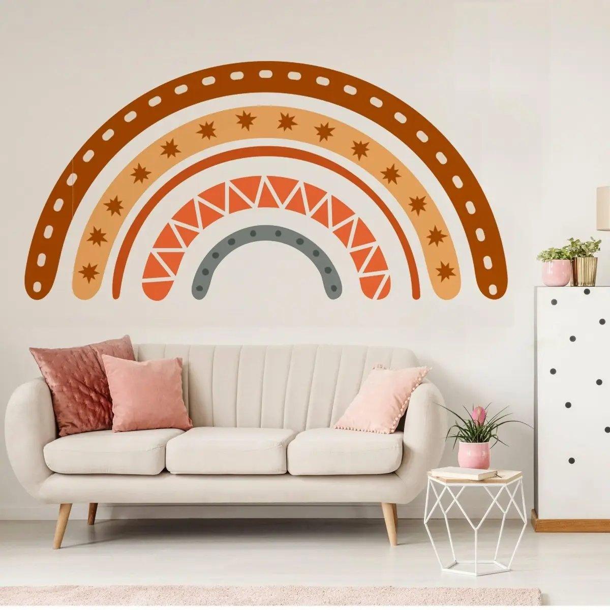 Boho chic multicolor rainbow wall decal above a cozy sofa, adding vibrant charm to home decor.
