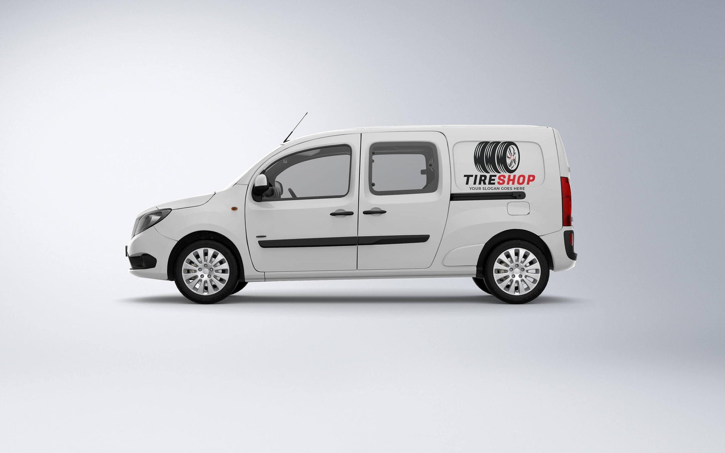 White delivery van with 'TIRESHOP' logo, ideal for tire services and vehicle maintenance.