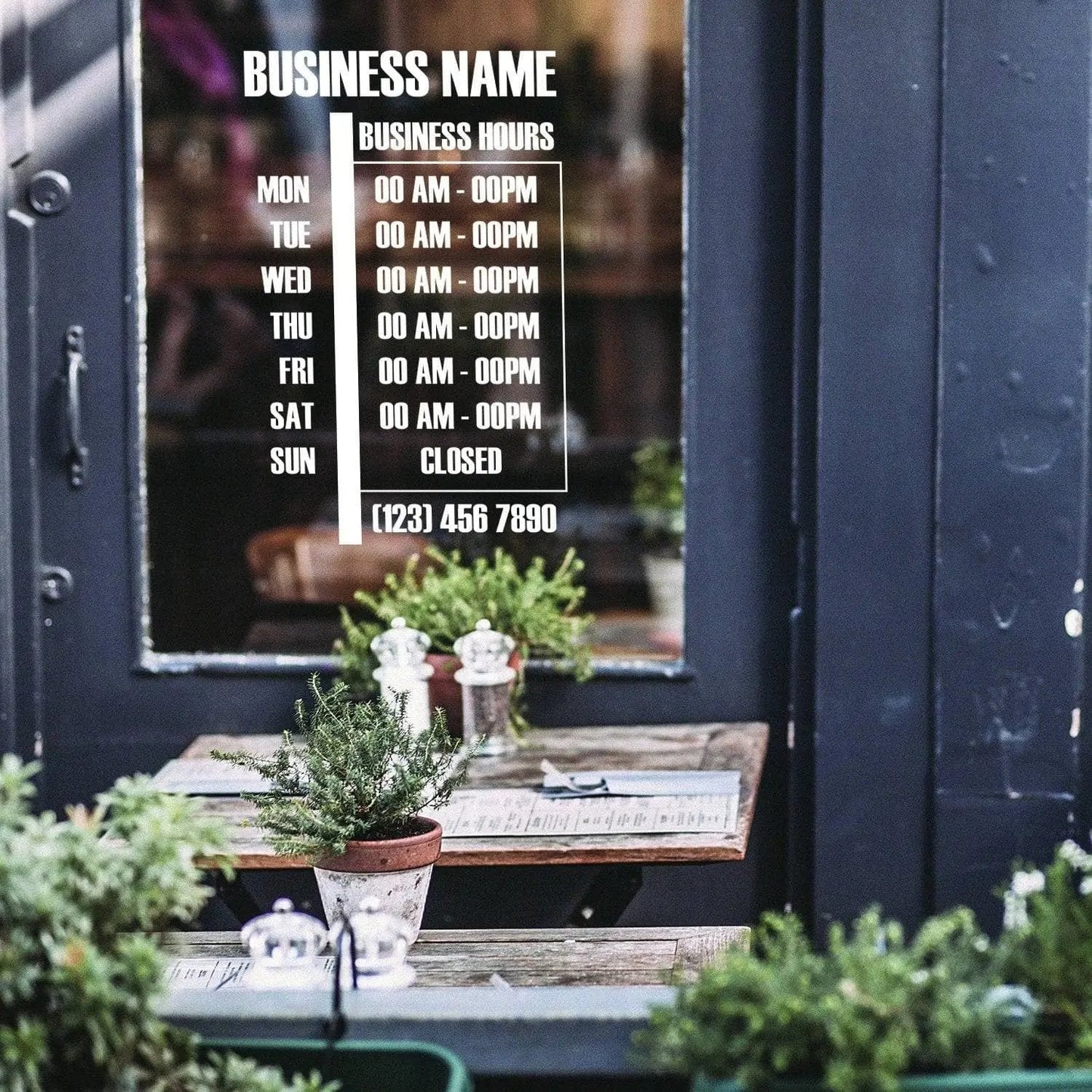 Personalized vinyl business hours decal displayed on a storefront window, detailing daily hours and contact information.
