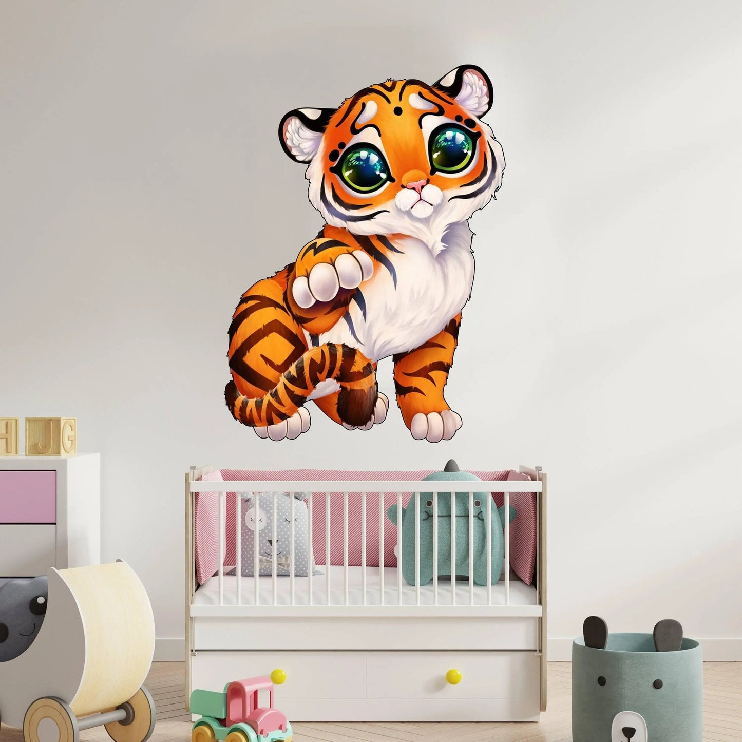 Whimsical tiger wall decal in a nursery setting, adding playful charm and vibrant colors to the space.