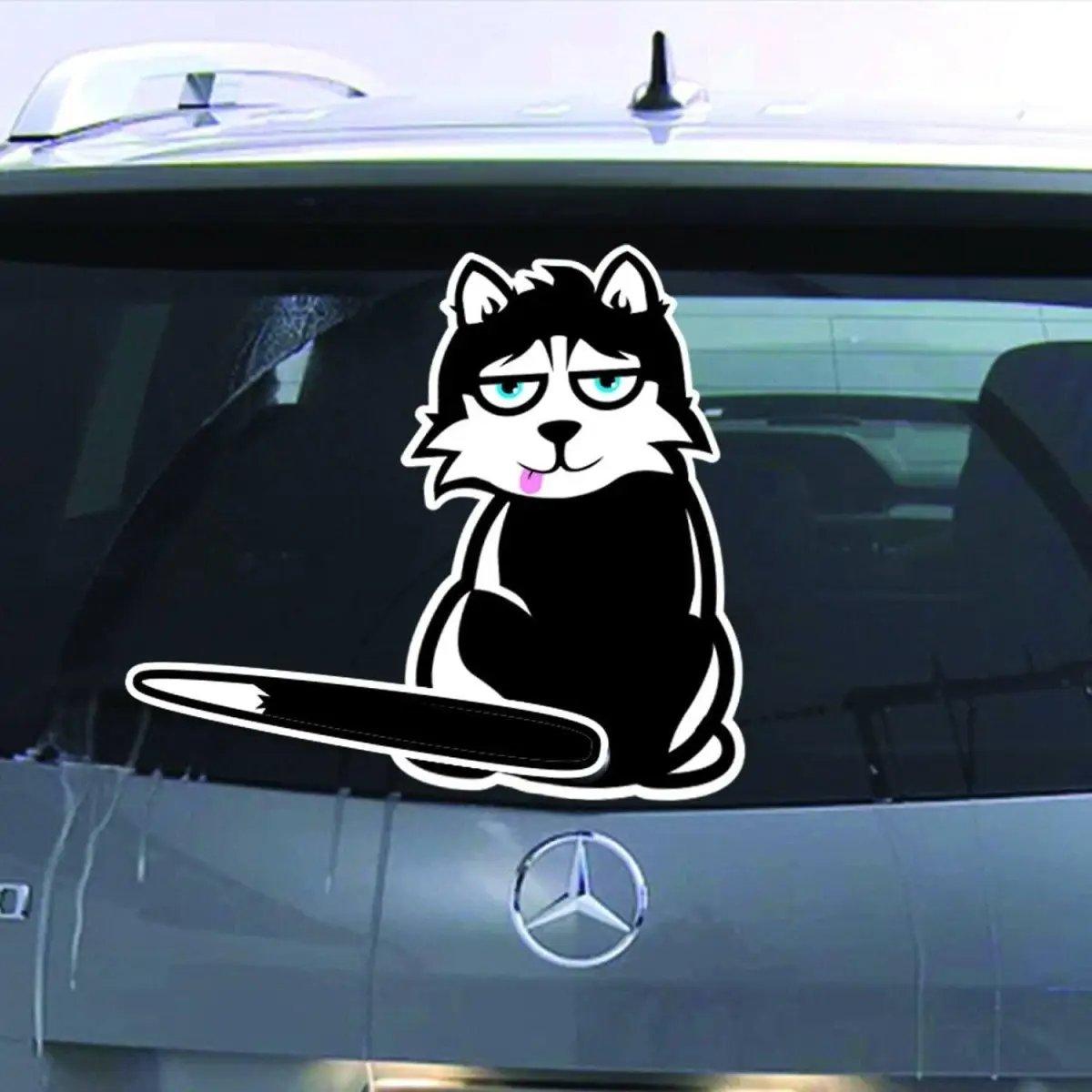Feline fun rear window car decal featuring a cartoon cat with a cheeky expression on a vehicle.