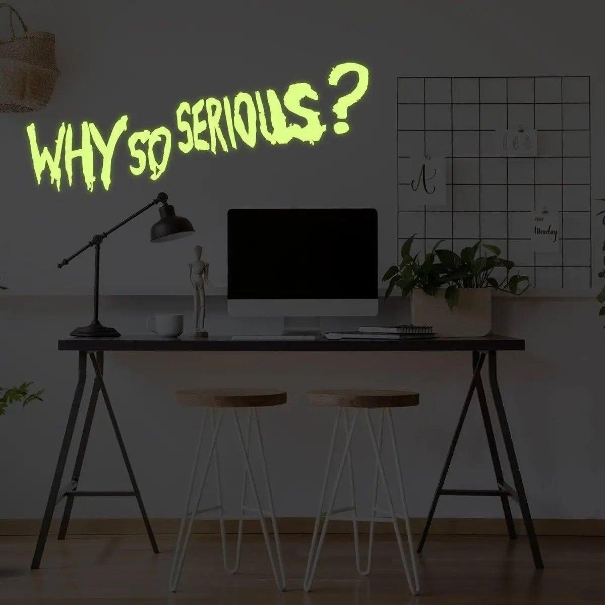 Joker wall art decal with luminous 'Why So Serious?' quote in a stylish office setting.