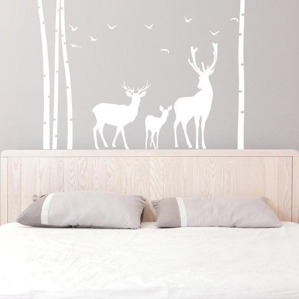 Deer and moose wildlife wall decal with birch trees, adding nature charm to a nursery or kids room.