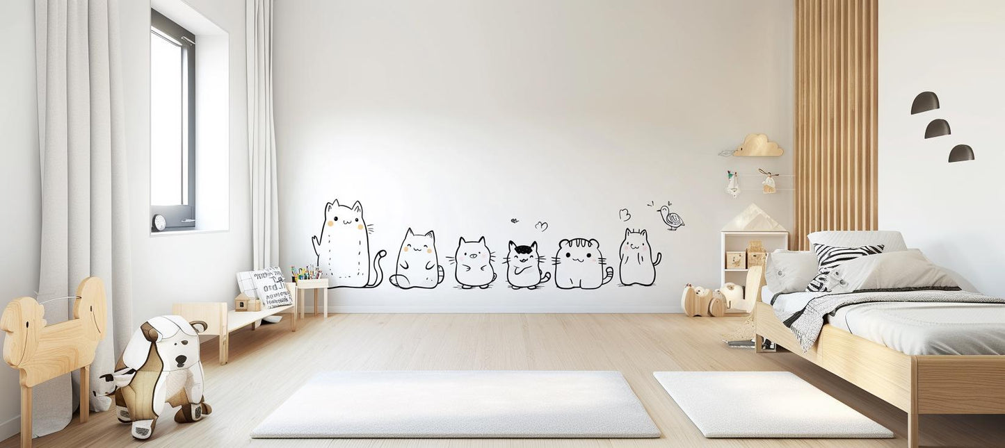 Cute cat wall decal set displayed in a kids' room, featuring playful cartoon cats on a light wall.