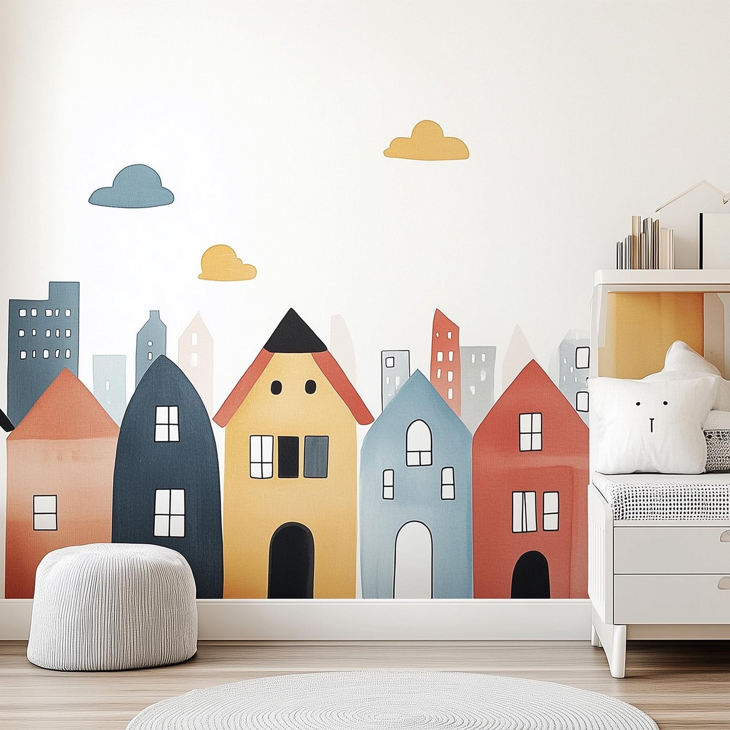 Colorful town wall decal featuring whimsical houses and clouds, perfect for kids' rooms and nurseries.