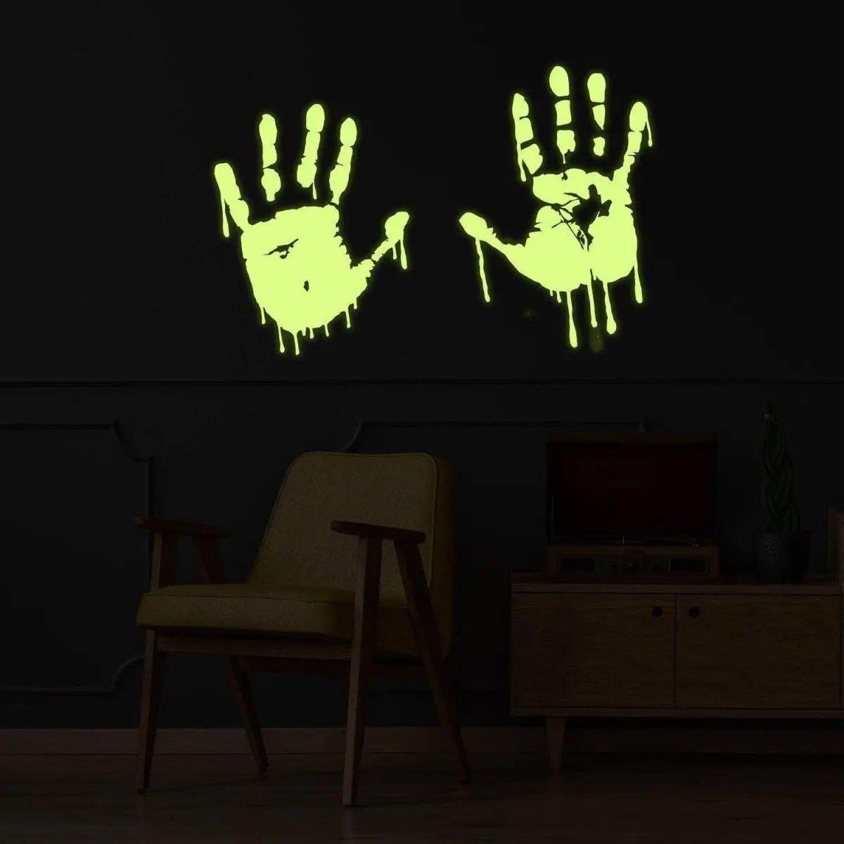 Luminous zombie blood wall decal featuring glowing bloody hands on a dark wall, perfect for horror-themed decor.