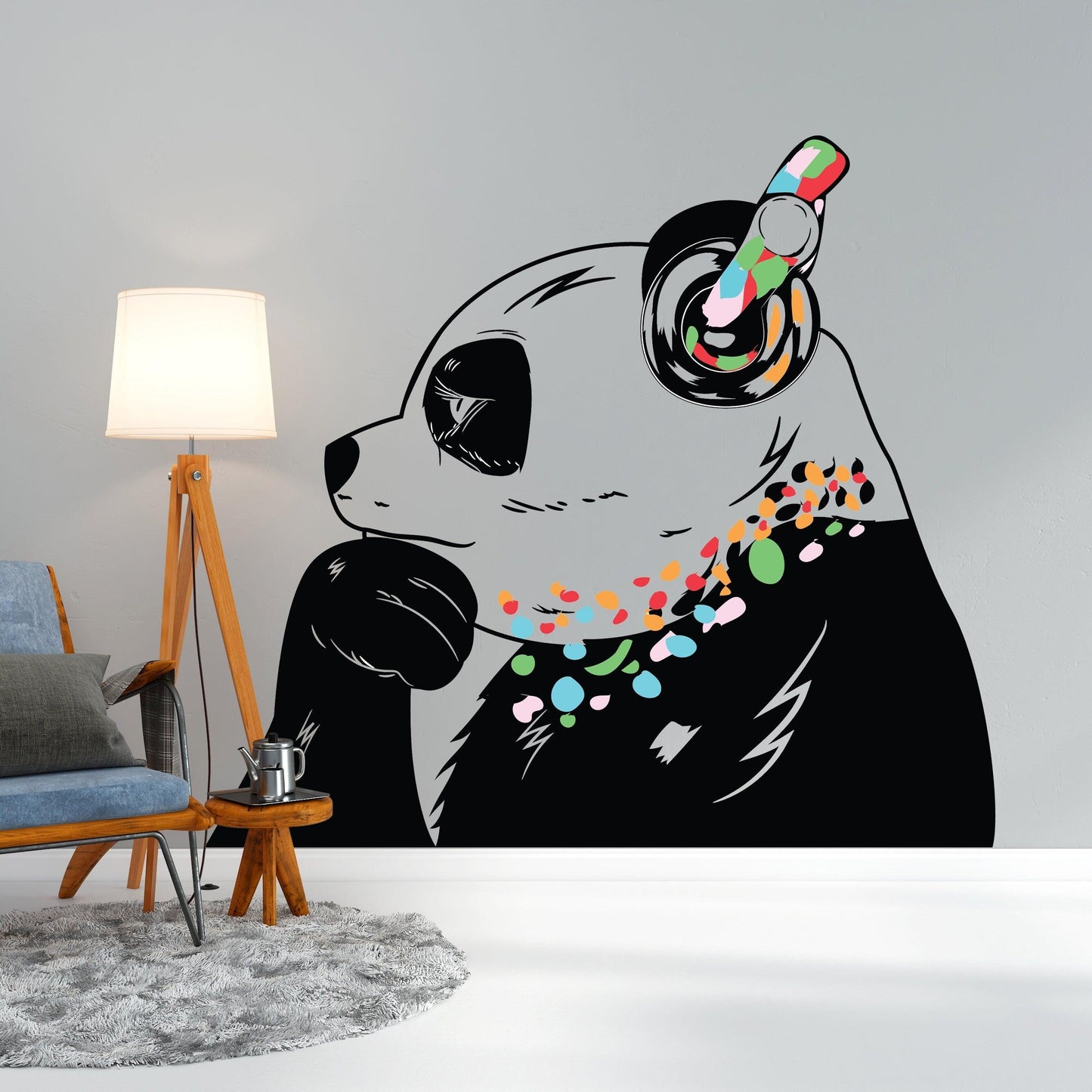 Banksy-inspired panda wall decal wearing headphones, vibrant colors, perfect for adding flair to any room.