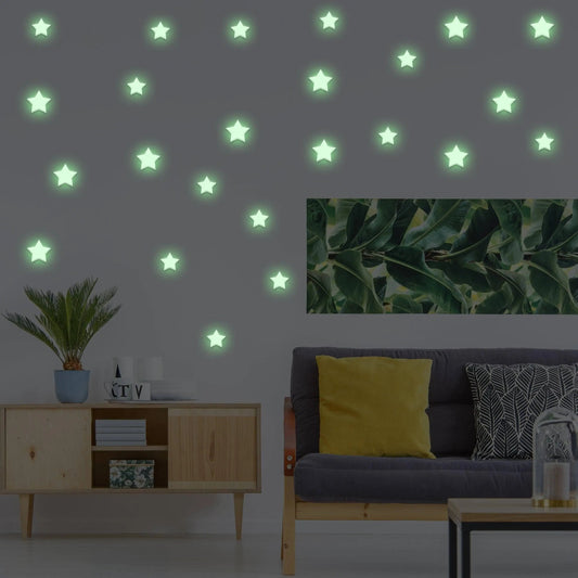 Glow in the dark star stickers creating a celestial scene on a bedroom wall with a cozy decor.