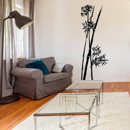 Bamboo wall art decal in a modern living room, featuring a stylish couch and glass coffee table.