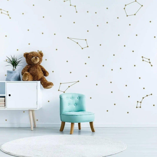 Celestial Dreams wall stickers featuring constellations and stars, creating a cosmic room decor with a teddy bear.