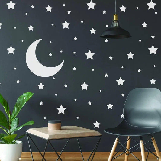 Celestial Dreams Wall Decals featuring white stars and moon on a dark wall, creating a magical room ambiance.