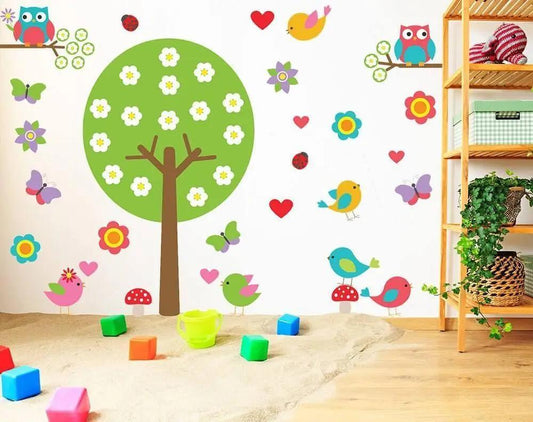 Vibrant tree wall sticker design with colorful birds, butterflies, and flowers in a playful nursery setting.