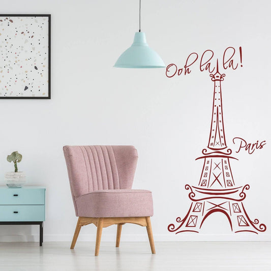 Eiffel Tower wall decal in a chic room with pink chair, adding a Parisian touch to indoor decor.