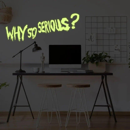 Joker wall art decal with luminous 'Why So Serious?' quote in a stylish office setting.