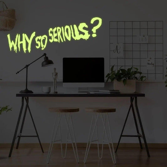 Joker wall art decal with luminous 'Why So Serious?' quote in a stylish office setting.