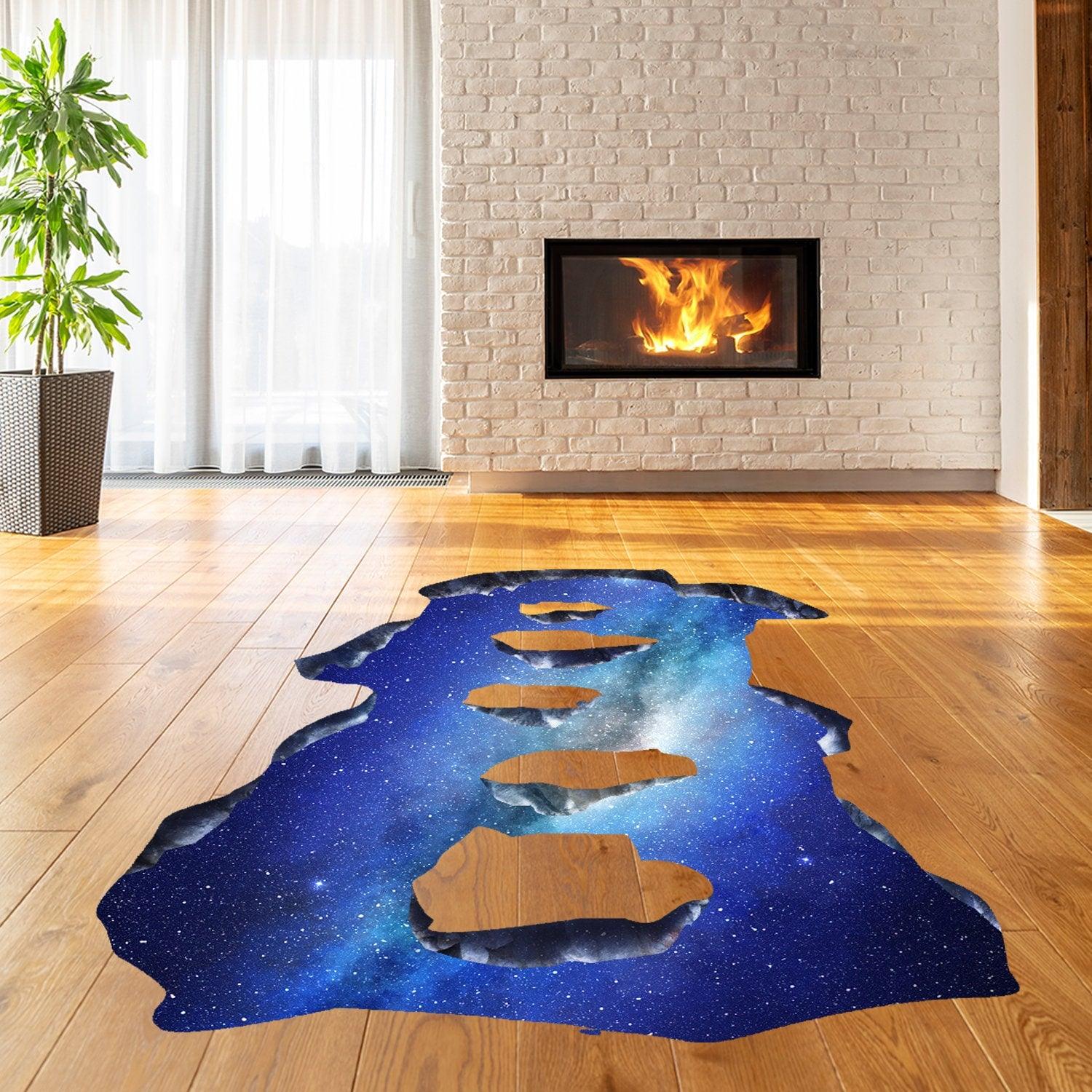3D galaxy art floor decal in living room, creating a portal hole illusion on wooden floor.