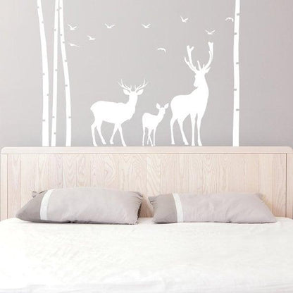 Deer and moose wildlife wall decal with birch trees, adding nature charm to a nursery or kids room.