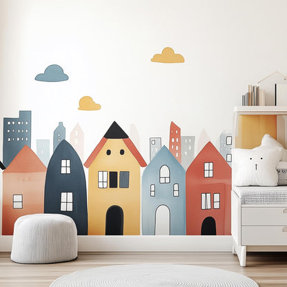 Colorful town wall decal featuring whimsical houses and clouds, perfect for kids' rooms and nurseries.