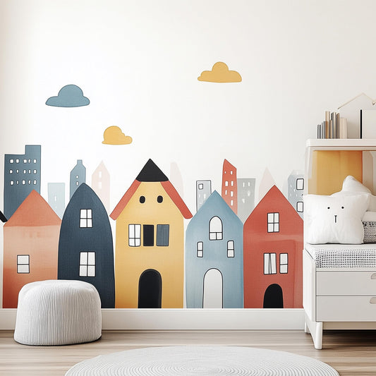 Colorful town wall decal featuring whimsical houses and clouds, perfect for kids' rooms and nurseries.
