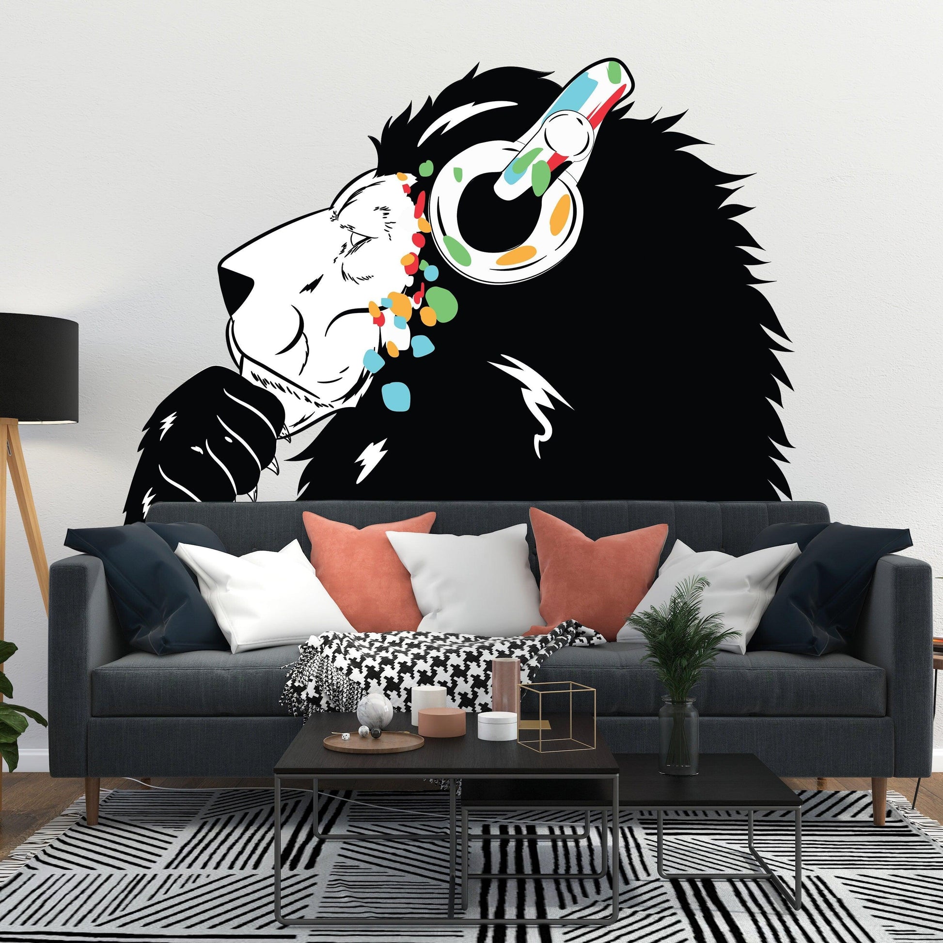 Contemporary lion DJ wall decal featuring colorful headphones, adding artistic flair to modern living space.