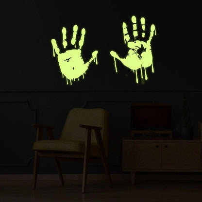Luminous zombie blood wall decal featuring glowing bloody hands on a dark wall, perfect for horror-themed decor.